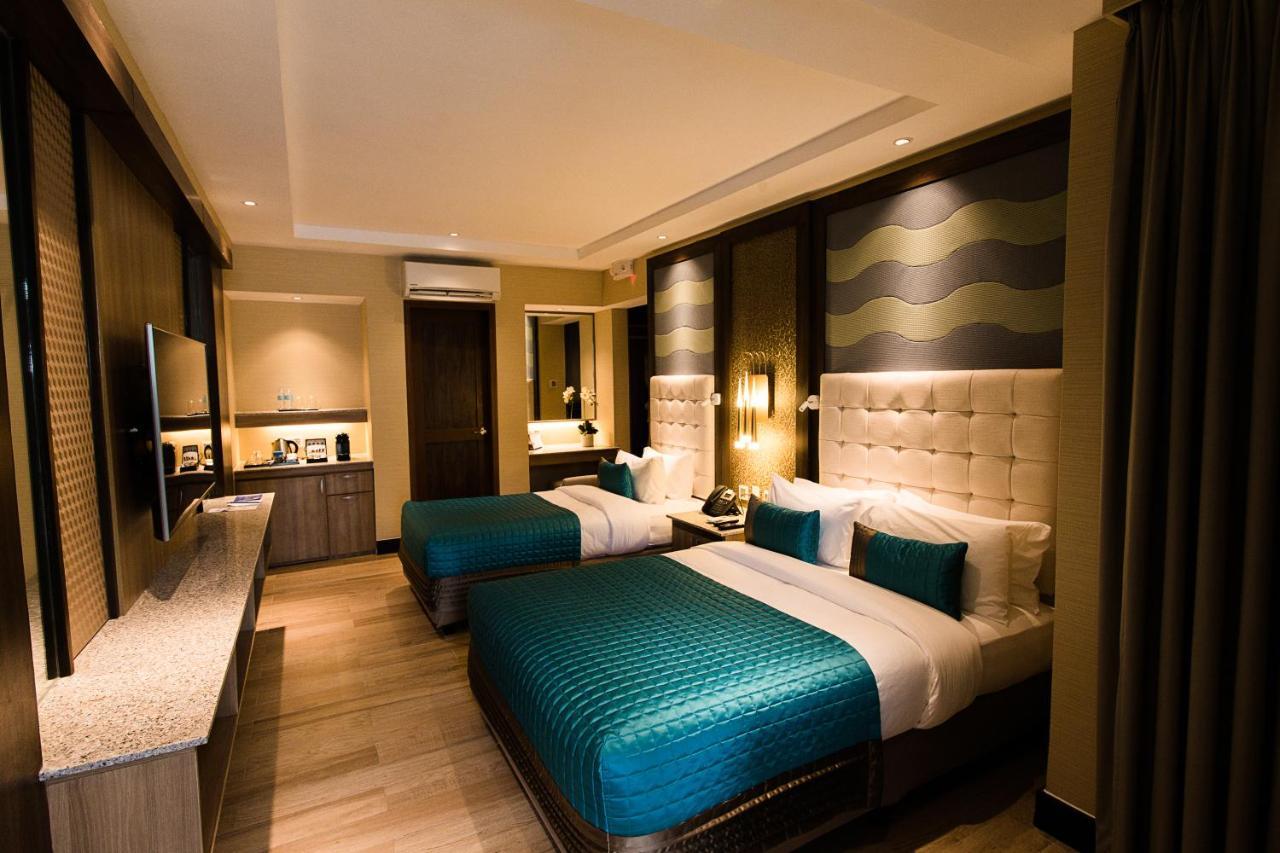 Acuatico Beach Resort & Hotel Inc. San Juan  Bagian luar foto