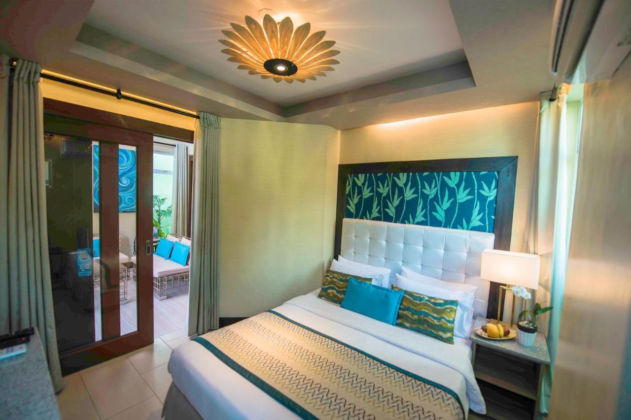 Acuatico Beach Resort & Hotel Inc. San Juan  Bagian luar foto